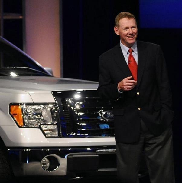 Company President and CEO Alan Mulally shares first-quarter financial results with employees during a global town hall meeting at Fords World Headquarters.